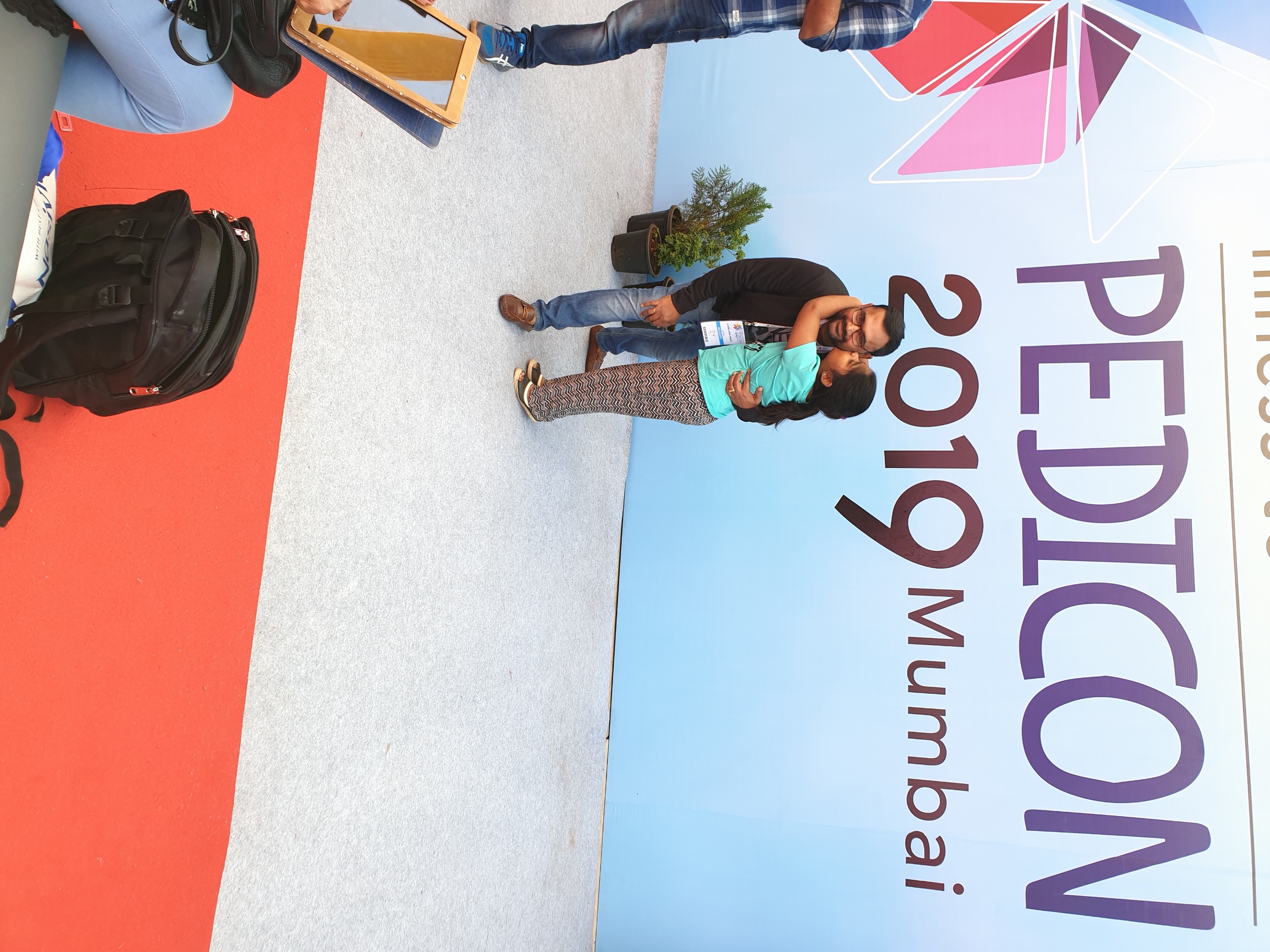 Doctor with happy patient at Pedicon