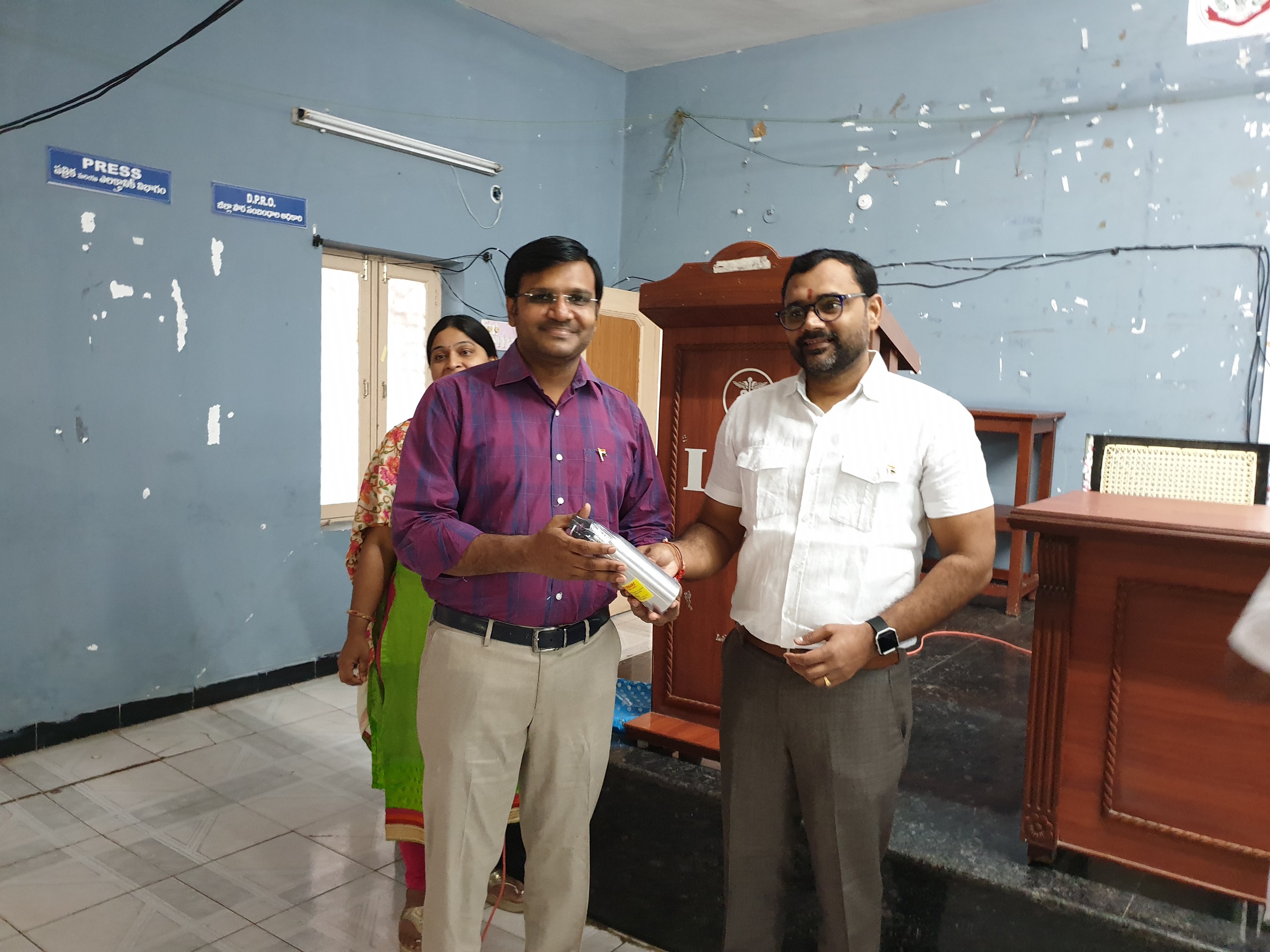 Doctor receiving honor at camp