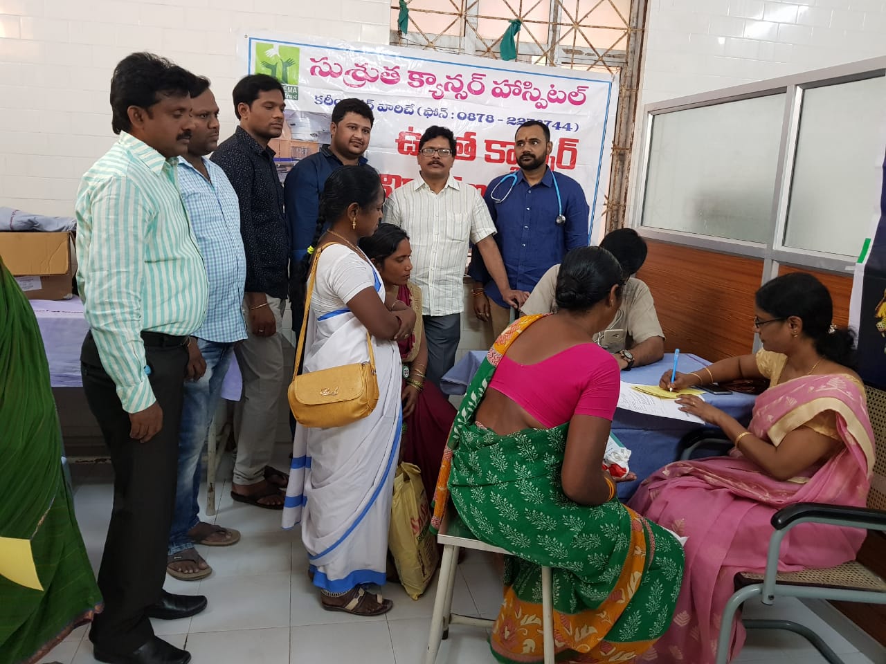 Medical Staff assisting village patients